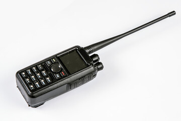 Black walkie-talkie on a white background close-up