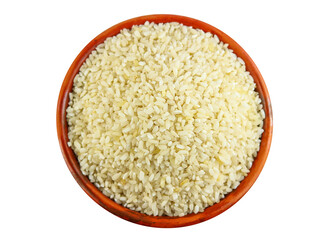 White rice in clay bowl isolated on a white background, Top view