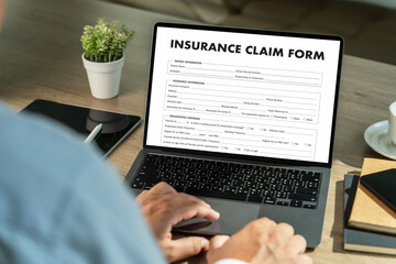 Insurance claim form on computer Document Application