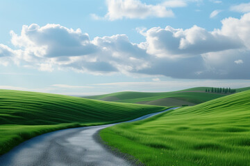 a road going through a green field in the sky at a sunny day
