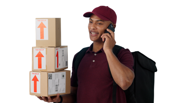 Phone call, courier and portrait of man with packages for delivery, shipping or distribution. Ecommerce, parcel and person on mobile conversation with boxes isolated by transparent png background.