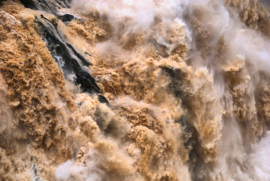 CAIRNS, AUSTRALIA - JAN 22 : Flooded Barron River entering the Barron River Gorge north of Cairns January 22, 2011 in Cairns, Queensland, Australia
