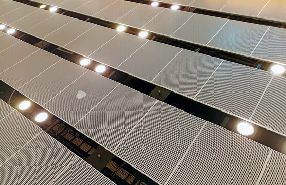 Solar panels on the roof of a modern office building, closeup of photo