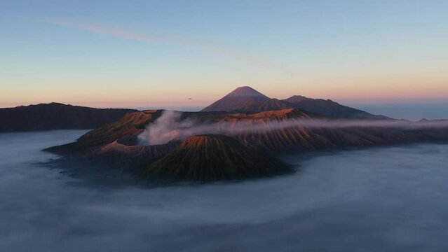 Aerial view of Mout Bromo in sunrise with low fog, Java, Indonesia