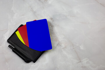 Three football cards in notebook