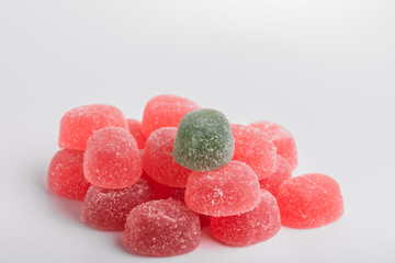 Jelly raspberry and apple candies on a white background closeup.Swedish gummy jelly candies.