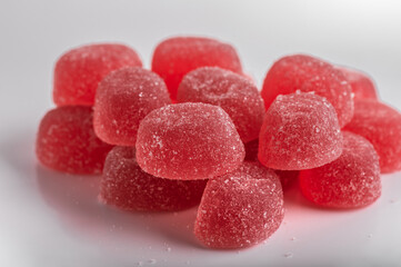 Jelly raspberry candies on a white background close-up.Swedish gummy jelly candies.