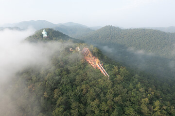 Aerial view of Wat Prathat Doi Prachan and Great Buddha at Doi Phra Chan is a towering bronze...