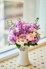 A composition of flowers from a florist. Decoration of an event or holiday. Wedding bouquet