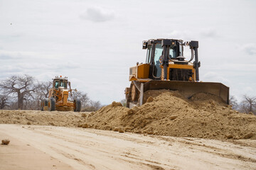 construction machines at works, dozer, roller machine, excavator, crawler rock drill machine,...