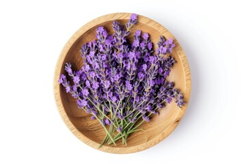 Lavender flowers in wooden plate, isolated on white, flat lay view