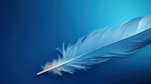 a close up of a blue feather on a blue background with a blurry image of a bird's wing.