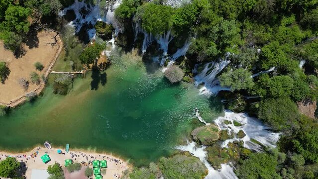 Aerial view of Kravica Waterfall in Bosnia and Herzegovina. The Kravica waterfall is a pearl of the Herzegovinian landscape. It is a unique natural beauty in the Trebizat River. Oasis in stone.