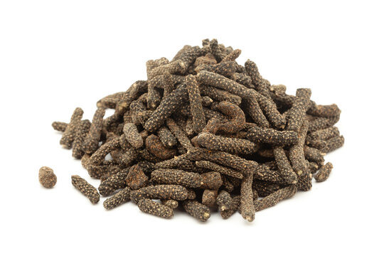 Close-up of Dry Organic Long pepper (Piper longum) fruit, isolated on a white background. Front view