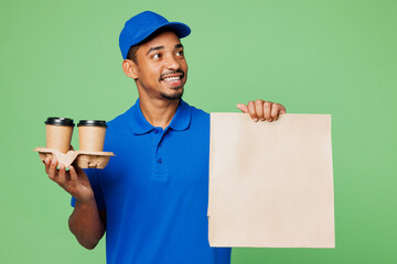 Delivery guy employee man wears blue cap t-shirt uniform workwear work as dealer courier hold...