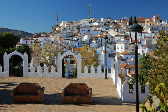 The village of Comares, Axarquia, Malaga province, Andalusia, Spain, viewed from the Arabic Castle. Comares is a village of Moorish origin with roofs and whitewashed houses