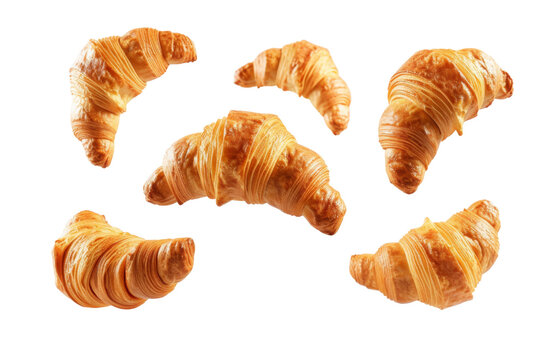 Croissants that fresh and delicious falling in the air isolated on background, Breakfast time, popular plain croissant breads.