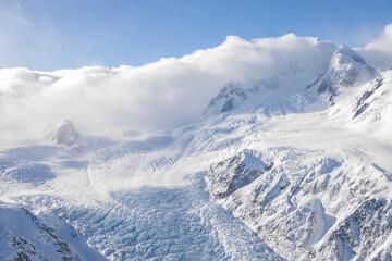 aerial view of franz josef glacier with clouds. New Zealand