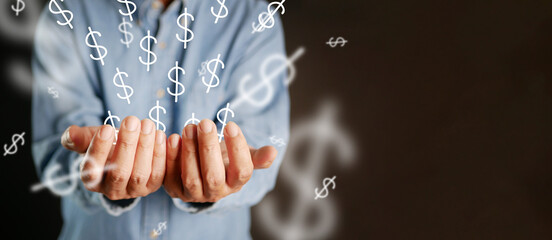 Many dollar signs spring out from a businessman's hand. Business idea makes money, successful creative ideas for business entrepreneur. A man holds a lot of dollar icons. - obrazy, fototapety, plakaty