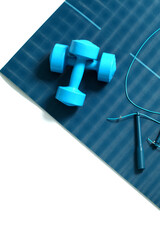 Set for practicing exercise with dumbbells and skipping rope