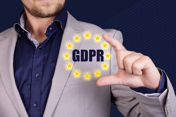 General Data Protection Regulation, GDPR, European Data Privacy Law. Businessman holds EU flag with...