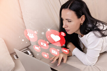Freelance woman copywriter using laptop for social media marketing and website, social media...