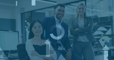 Image of data processing over diverse business people smiling in office