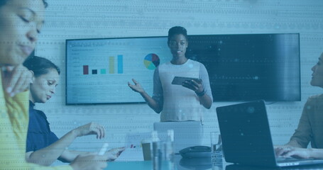 Image of data processing over diverse business people at meeting in office