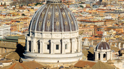 Closeup of the dome of the Papal Basilica of Saint Peter in the Vatican located in Rome, Italy....