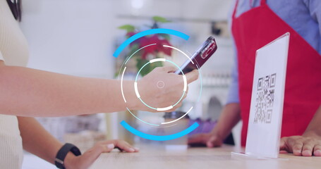 Image of scope scanning over diverse shop assistant and customer paying with smartphone