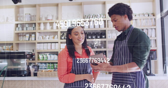 Image of data processing over diverse shop assistants talking - Powered by Adobe