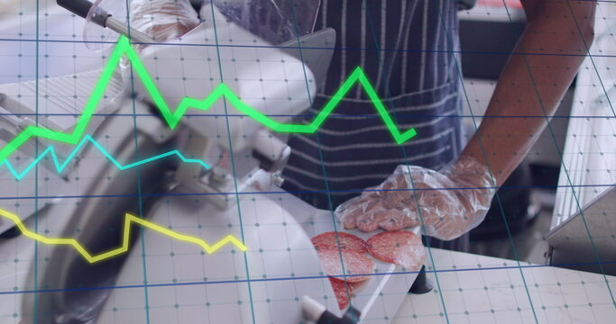 Image of data processing over biracial male shop assistant cutting salami - Powered by Adobe