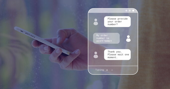 Image of digital interface with messages over hand of caucasian man using smartphone - Powered by Adobe