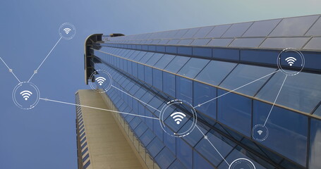 Image of network of conncetions with icons over modern building