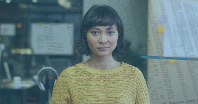 Image of data processing over biracial businesswoman smiling - Powered by Adobe