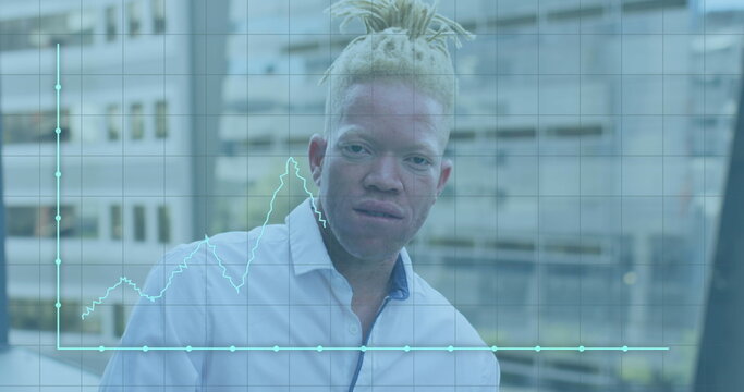 Image of data processing over albino african american businessman smiling