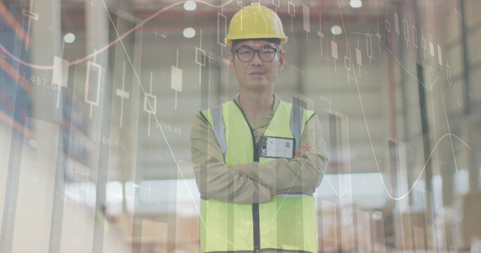 Image of statistics and data processing over biracial man working in warehouse - Powered by Adobe
