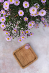 Wooden plate with flowers. Craft