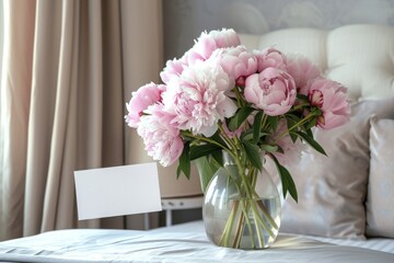 serene and elegant bedroom setting highlighted by a bouquet of blooming pink peonies placed on a neatly made bed
