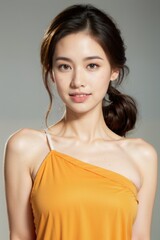 summertime asian woman delightful freshness smiling causual summer dress portrait shot over plain color background summer travel and joyful moment