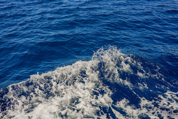 View of water and waves while sailing on the sea