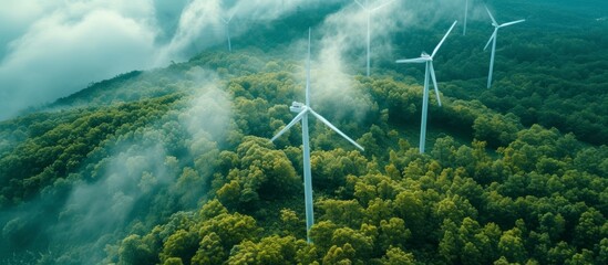 Majestic wind turbines scattered throughout lush green forest landscape