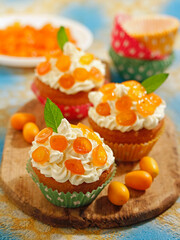 Cupcakes with kumquats.