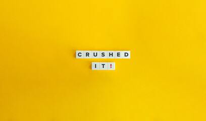 Crushed It! Text on Block Letter Tiles on Yellow Background. Minimal Aesthetics.