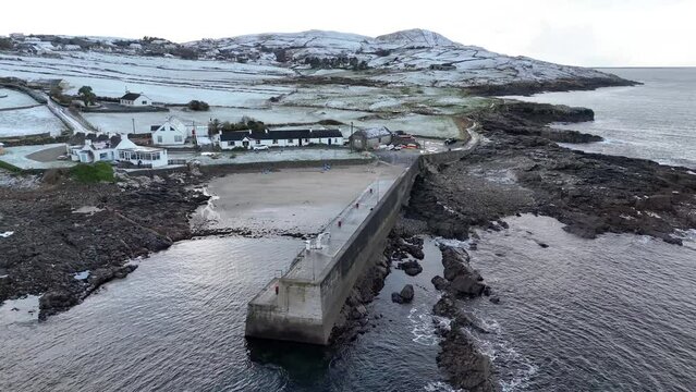 Aerial view ofa snow covered Portnoo harbour in County Donegal, Ireland.