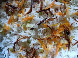 Biryani is a mixed rice dish most popular in South Asia. It is made with rice, some type of meat and spices. 