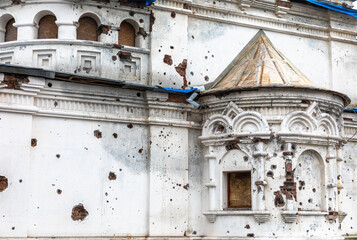 Traces of bullets and shell fragments on the walls of the templ