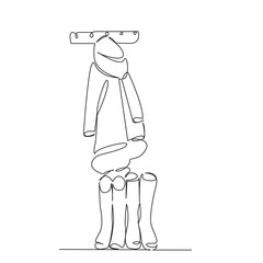 clothes are hanging on a hanger, and of boots are standing.