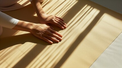 Mindful tranquility: Close-up of hands in yoga practice on a mat, highlighting the beauty of meditation and self-care