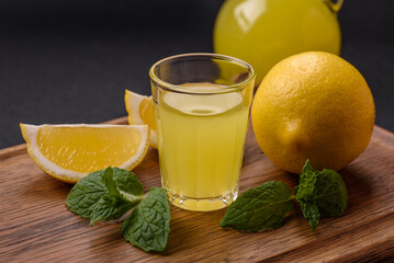 Alcoholic drink yellow limoncello in a small glass